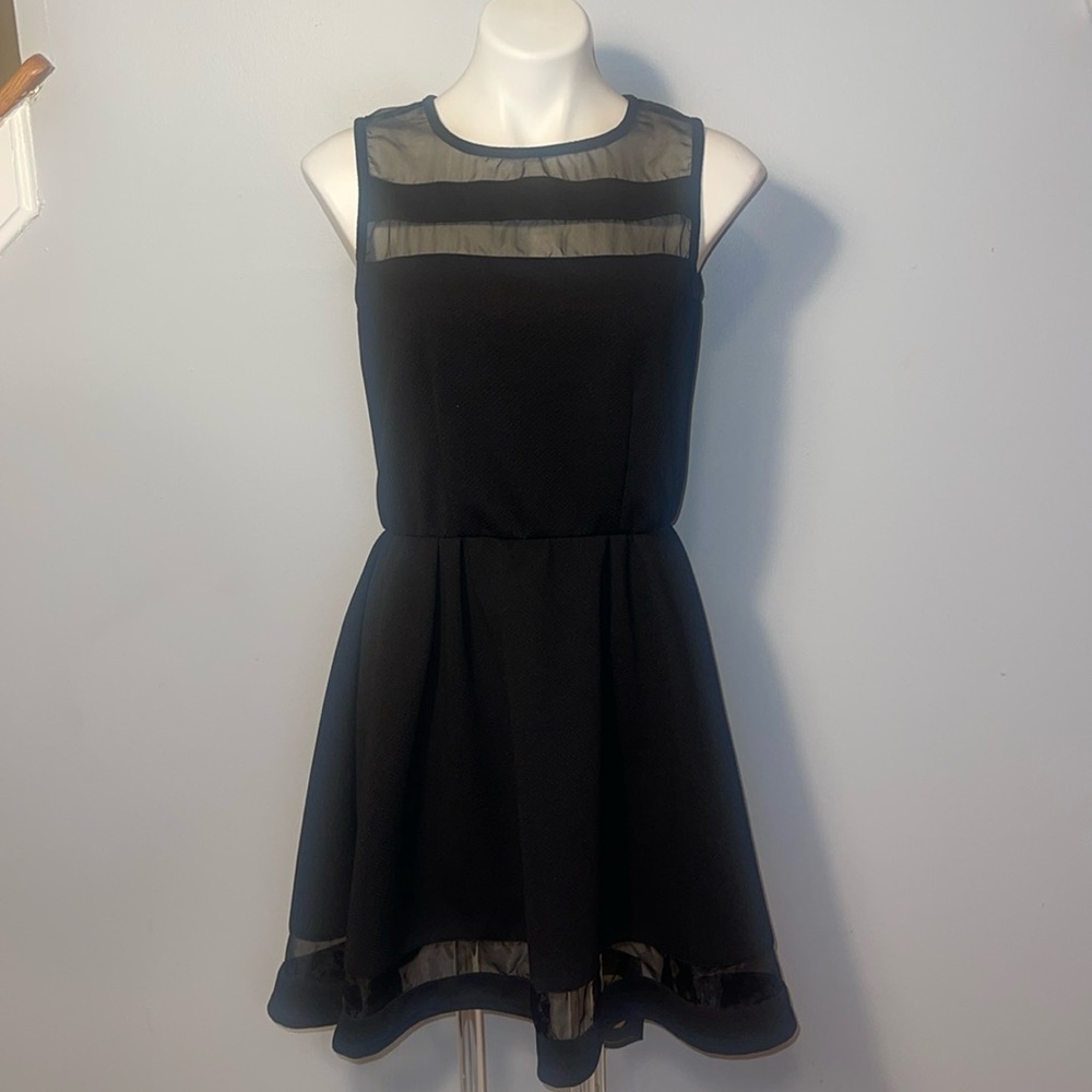 Liberty Love ladies fit and flare black dress with mesh panels. Medium.